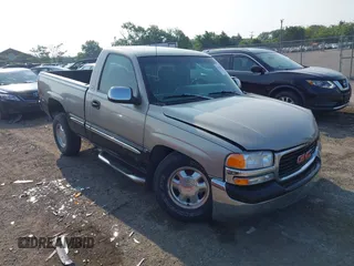 1999 GMC Sierra 1500 SLE z VIN 1GTEK14T3XZ536618, wystawiony jako IAAI lot #42423516 z przebiegiem 138 843 mil mil oraz . Historia ofert i sprzedaży dostępna na DreamBid. Obrazek 1.