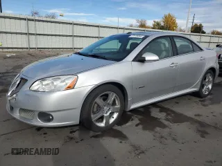 2009 Pontiac G6 with VIN 1G2ZL577094232011, listed as a Copart auction lot 77175054 with 133,353 mi miles and Salvage title. Bid and sale history available at DreamBid. Image 1.