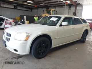 2006 Dodge Magnum z VIN 2D8GZ57286H100782, wystawiony jako IAAI lot #41816780 z przebiegiem 203 839 mil mil oraz . Historia ofert i sprzedaży dostępna na DreamBid. Obrazek 17.