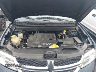 2014 Dodge Journey SXT with VIN 3C4PDCBB4ET245932, listed as a IAAI auction lot 41857444 with 228,827 mi miles. Bid and sale history available at carsss.com. Image 10.