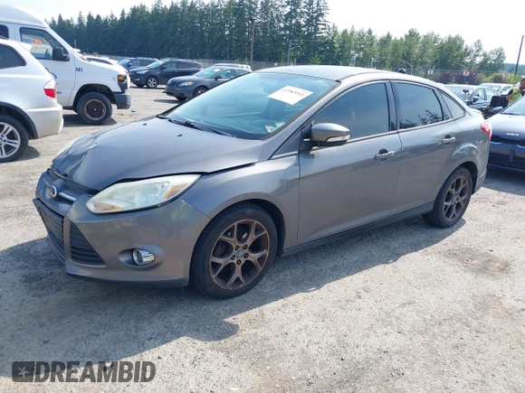 2013 Ford Focus SE with VIN 1FADP3F28DL233822, listed as a IAAI auction lot 42583041 with 135,728 mi miles and . Bid and sale history available at DreamBid. Image 2.