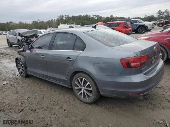 2018 Volkswagen Jetta 1.4T SE with VIN 3VWDB7AJ8JM261075, listed as a Copart auction lot 88881485 with 128,762 mi miles and Salvage Title. Bid and sale history available at carsss.com. Image 2.