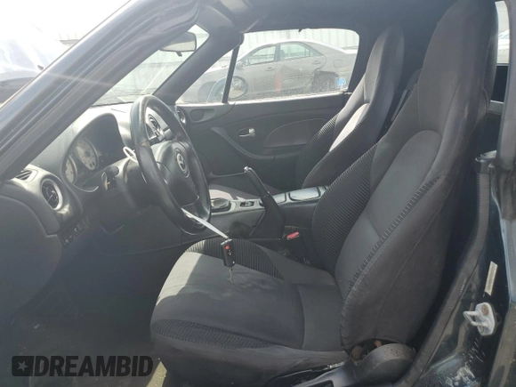 2005 Mazda MX-5 Miata LS with VIN JM1NB353X50410655, listed as a Copart auction lot 63337515 with 118,409 mi miles and Clean title. Bid and sale history available at DreamBid. Image 7.