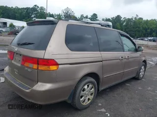 2003 Honda Odyssey EX-L with VIN 5FNRL180X3B151488, listed as a IAAI auction lot 42681426 with 231,065 mi miles and . Bid and sale history available at DreamBid. Image 4.