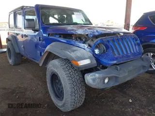 2020 Jeep Wrangler Unlimited Sport Altitude with VIN 1C4HJXDG4LW312551, listed as a IAAI auction lot 41633675 with 60,097 mi miles and . Bid and sale history available at DreamBid. Image 1.