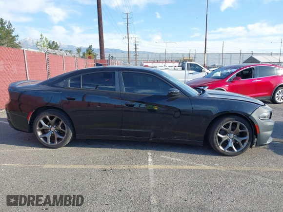 2015 Dodge Charger SXT with VIN 2C3CDXHG9FH915191, listed as a IAAI auction lot 41850427 with 164,535 mi miles and . Bid and sale history available at DreamBid. Image 13.