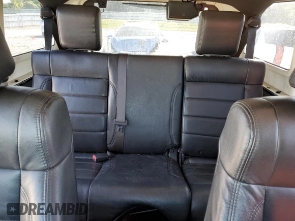 2008 Jeep Wrangler Unlimited Sahara with VIN 1J4GB59138L506461, listed as a Copart auction lot 75082664 with 178,944 mi miles and Salvage title. Bid and sale history available at DreamBid. Image 10.