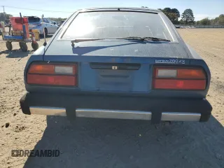 1979 Datsun 280ZX z VIN HS130133365, wystawiony jako Copart lot #77113584 z przebiegiem 99 721 mil mil oraz Szkody całkowita. Historia ofert i sprzedaży dostępna na DreamBid. Obrazek 6.