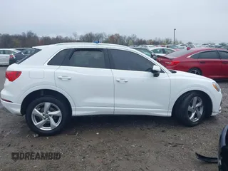 2020 Audi Q3 Premium with VIN WA1AECF35L1030273, listed as a IAAI auction lot 42006553 with 81,944 mi miles. Bid and sale history available at carsss.com. Image 13.