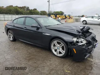 2014 BMW 6 Series 640i z VIN WBA6A0C50ED317255, wystawiony jako Copart lot #73492534 z przebiegiem 146 428 mil mil oraz Czysty tytuł • Clean title. Historia ofert i sprzedaży dostępna na DreamBid. Obrazek 4.