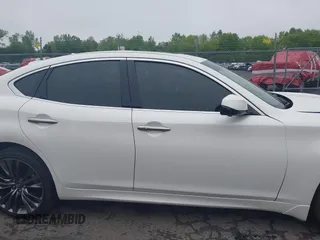 2016 Infiniti Q70 z VIN JN1BY1AR4GM271282, wystawiony jako IAAI lot #42204923 z przebiegiem 104 244 mil mil oraz . Historia ofert i sprzedaży dostępna na DreamBid. Obrazek 13.