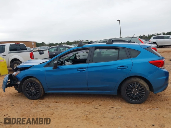 2019 Subaru Impreza with VIN 4S3GTAA64K3718084, listed as a IAAI auction lot 41726910 with 56,523 mi miles and . Bid and sale history available at DreamBid. Image 14.