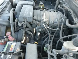 2002 Toyota Tundra SR5 z VIN 5TBBT44132S275820, wystawiony jako IAAI lot #43328970 z przebiegiem 138 926 mil mil oraz . Historia ofert i sprzedaży dostępna na DreamBid. Obrazek 18.