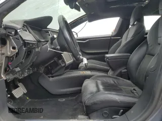 2016 Tesla Model S 90D z VIN 5YJSA1E41GF171522, wystawiony jako Copart lot #59966545 z przebiegiem Nie podano mil oraz Szkoda całkowita • Salvage title. Historia ofert i sprzedaży dostępna na DreamBid. Obrazek 7.