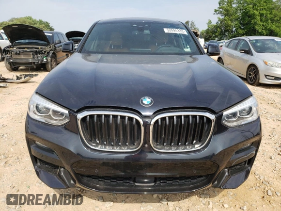 2021 BMW X4 xDrive30i with VIN 5UX2V1C04M9E92675, listed as a Copart auction lot 52495333 with 54,111 mi miles. Bid and sale history available at carsss.com. Image 5.