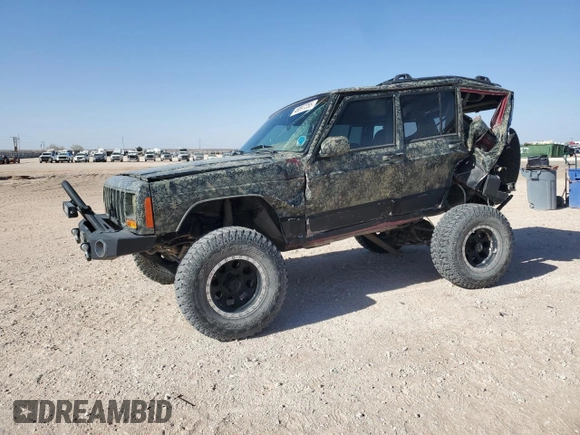 1999 Jeep Cherokee Sport with VIN 1J4FF68S6XL645028, listed as a Copart auction lot 48897255 with 218,552 mi miles and Salvage Title. Bid and sale history available at carsss.com. Image 1.