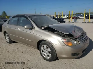 2009 Kia Spectra LX z VIN KNAFE222995618257, wystawiony jako Copart lot #56179025 z przebiegiem 270 087 mil mil oraz Szkoda całkowita • Salvage title. Historia ofert i sprzedaży dostępna na DreamBid. Obrazek 4.