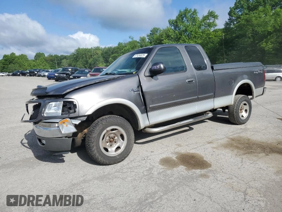 2003 Ford F-150 XL with VIN 2FTRX18L73CA49989, listed as a Copart auction lot 57434025 with 141,876 mi miles and Salvage title. Bid and sale history available at DreamBid. Image 1.