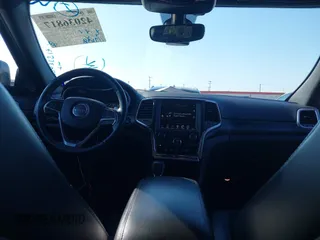 2017 Jeep Grand Cherokee Laredo with VIN 1C4RJFAGXHC817666, listed as a IAAI auction lot 42036817 with 119,698 mi miles. Bid and sale history available at carsss.com. Image 18.