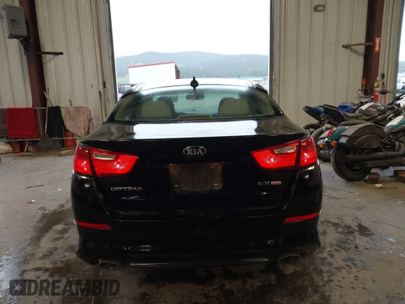 2014 Kia Optima EX z VIN 5XXGN4A75EG339104, wystawiony jako IAAI lot #42311979 z przebiegiem 115 119 mil mil oraz . Historia ofert i sprzedaży dostępna na DreamBid. Obrazek 16.