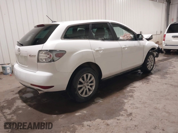 2012 Mazda CX-7 i Touring z VIN JM3ER2C51C0411837, wystawiony jako IAAI lot #42023100 z przebiegiem 85 112 mil mil oraz . Historia ofert i sprzedaży dostępna na DreamBid. Obrazek 4.