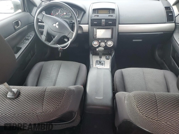 2012 Mitsubishi Galant FE z VIN 4A32B2FF0CE021610, wystawiony jako Copart lot #54020525 z przebiegiem 103 096 mil mil oraz Szkoda całkowita • Salvage title. Historia ofert i sprzedaży dostępna na DreamBid. Obrazek 8.