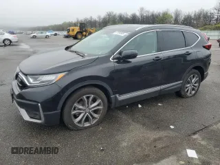 2022 Honda CR-V Touring z VIN 2HKRW2H99NH654414, wystawiony jako Copart lot #57093885 z przebiegiem Nie podano mil oraz Szkoda całkowita • Salvage title. Historia ofert i sprzedaży dostępna na DreamBid. Obrazek 1.