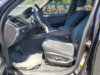 2011 BMW X5 35d with VIN 5UXZW0C58BL662048, listed as a Copart auction lot 55648975 with 166,291 mi miles and Salvage title. Bid and sale history available at DreamBid. Image 7.