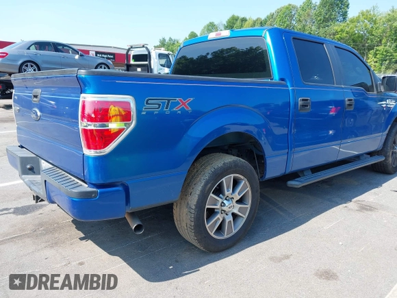 2014 Ford F-150 XL with VIN 1FTEW1CM7EKF31796, listed as a IAAI auction lot 42612772 with 183,685 mi miles and . Bid and sale history available at DreamBid. Image 4.