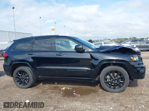 2021 Jeep Grand Cherokee Laredo E with VIN 1C4RJEAG0MC571375, listed as a IAAI auction lot 42087648 with 29,358 mi miles and . Bid and sale history available at DreamBid. Image 14.