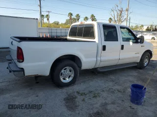 2001 Ford Super Duty F-250 XL with VIN 1FTNW20F61EB42376, listed as a Copart auction lot 74001054 with 215,944 mi miles and Salvage Title. Bid and sale history available at carsss.com. Image 3.