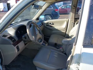 2003 Suzuki XL-7 Touring with VIN JS3TX92V734100178, listed as a IAAI auction lot 41386492 with 91,912 mi miles. Bid and sale history available at carsss.com. Image 5.