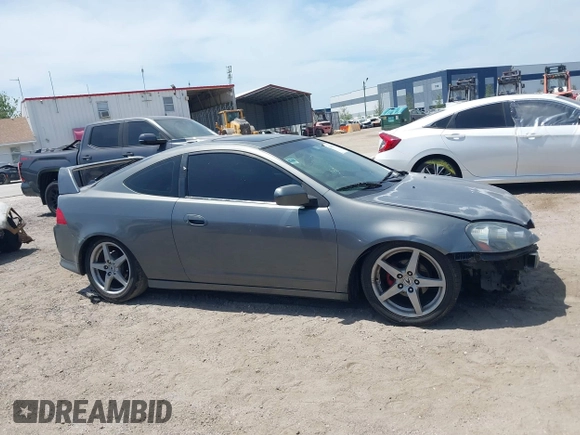 2005 Acura RSX z VIN JH4DC53885S010552, wystawiony jako IAAI lot #42086939 z przebiegiem 208 204 mil mil oraz . Historia ofert i sprzedaży dostępna na DreamBid. Obrazek 13.