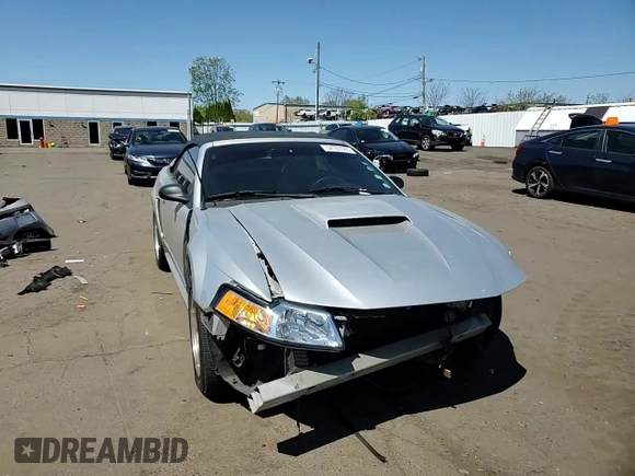 1999 Ford Mustang with VIN 1FAFP4448XF233101, listed as a Copart auction lot 54701005 with 54,585 mi miles and Salvage title. Bid and sale history available at DreamBid. Image 13.