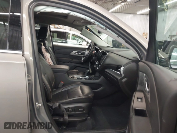 2018 Chevrolet Traverse LT z VIN 1GNEVHKW0JJ166321, wystawiony jako IAAI lot #42014168 z przebiegiem 81 442 mil mil oraz . Historia ofert i sprzedaży dostępna na DreamBid. Obrazek 5.