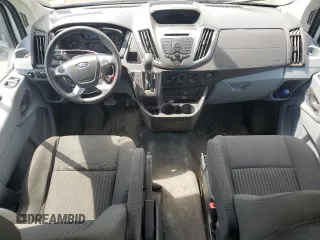 2016 Ford Transit Cargo with VIN 1FTYR2CM1GKB43234, listed as a Copart auction lot 65311135 with 59,502 mi miles and Salvage title. Bid and sale history available at DreamBid. Image 8.