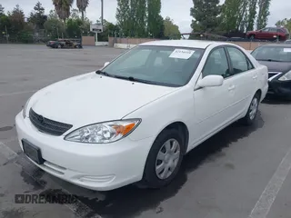 2004 Toyota Camry LE with VIN 4T1BE32K84U362436, listed as a IAAI auction lot 42134510 with 199,371 mi miles. Bid and sale history available at carsss.com. Image 6.