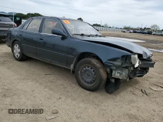 1994 Toyota Camry LE z VIN JT2GK12E2R0039606, wystawiony jako Copart lot #49840015 z przebiegiem 197 834 mil mil oraz Szkoda całkowita • Salvage title. Historia ofert i sprzedaży dostępna na DreamBid. Obrazek 4.
