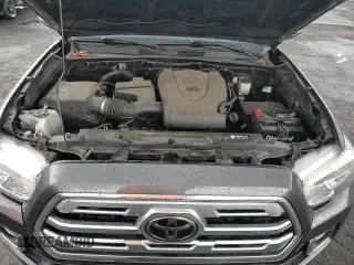 2019 Toyota Tacoma SR z VIN 3TMGZ5AN1KM223725, wystawiony jako Copart lot #81874835 z przebiegiem 107 541 mil mil oraz Szkoda całkowita • Salvage title. Historia ofert i sprzedaży dostępna na DreamBid. Obrazek 13.