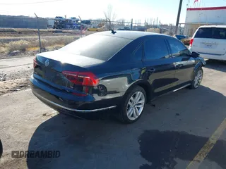2019 Volkswagen Passat 2.0T Wolfsburg Edition with VIN 1VWLA7A32KC012841, listed as a IAAI auction lot 41539683 with 75,897 mi miles. Bid and sale history available at carsss.com. Image 4.
