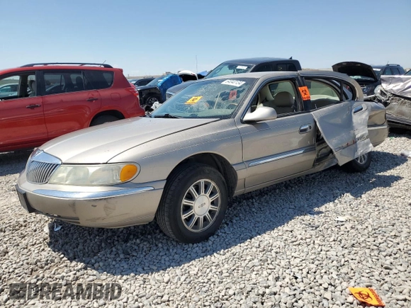2001 Lincoln Continental z VIN 1LNHM97V21Y698784, wystawiony jako Copart lot #64040134 z przebiegiem Nie podano mil oraz Szkoda całkowita • Salvage title. Historia ofert i sprzedaży dostępna na DreamBid. Obrazek 1.