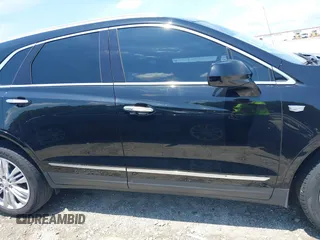 2018 Cadillac XT5 Premium Luxury AWD z VIN 1GYKNFRS3JZ112459, wystawiony jako IAAI lot #42590258 z przebiegiem 157 377 mil mil oraz . Historia ofert i sprzedaży dostępna na DreamBid. Obrazek 13.
