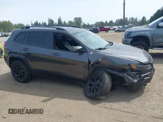 2019 Jeep Cherokee Trailhawk with VIN 1C4PJMBX2KD231734, listed as a IAAI auction lot 42235469 with 104,565 mi miles and . Bid and sale history available at DreamBid. Image 13.