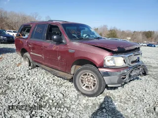 2000 Ford Expedition XLT with VIN 1FMRU166XYLA82466, listed as a Copart auction lot 42507135 with 214,014 mi miles and Salvage Title. Bid and sale history available at DreamBid. Image 4.