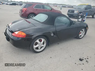 1998 Porsche Boxster с VIN WP0CA2982WU620882, выставлен на аукционе Copart как лот 50950515 с пробегом Не указан миль и Списание • Salvage title. История ставок и продаж доступна на DreamBid. Изображение 3.