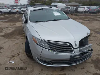 2013 Lincoln MKS EcoBoost with VIN 1LNHL9FT9DG611640, listed as a IAAI auction lot 41131303 with 135,550 mi miles. Bid and sale history available at carsss.com. Image 1.