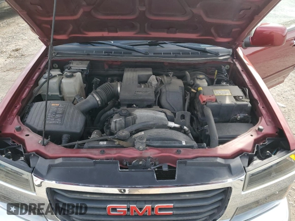 2011 GMC Canyon SLE1 with VIN 1GTH6MFE5B8134177, listed as a Copart auction lot 48243605 with 133,956 mi miles and Salvage Title. Bid and sale history available at carsss.com. Image 11.