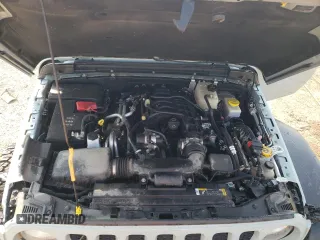 2023 Jeep Wrangler Willys with VIN 1C4HJXDG9PW615072, listed as a Copart auction lot 59606805 with 72,969 mi miles and Salvage title. Bid and sale history available at DreamBid. Image 11.