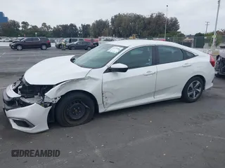 2020 Honda Civic LX z VIN 19XFC2F67LE212561, wystawiony jako IAAI lot #42272481 z przebiegiem 50 681 mil mil oraz . Historia ofert i sprzedaży dostępna na DreamBid. Obrazek 15.