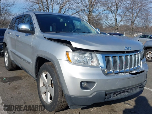 2011 Jeep Grand Cherokee Laredo z VIN 1J4RR4GG2BC511289, wystawiony jako IAAI lot #41240075 z przebiegiem 88 140 mil mil oraz . Historia ofert i sprzedaży dostępna na DreamBid. Obrazek 1.